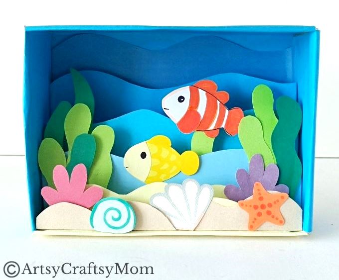 Celebrate the wonderful diversity of ocean life as you make this beautiful cardboard box underwater diorama, filled with colorful fish and plants!