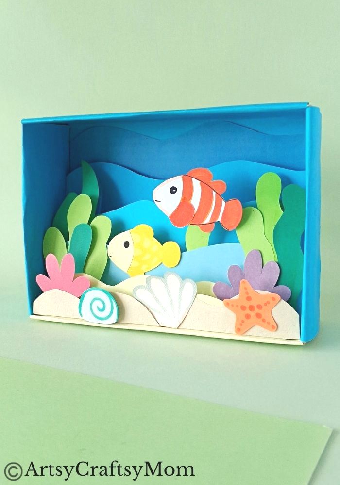 Celebrate the wonderful diversity of ocean life as you make this beautiful cardboard box underwater diorama, filled with colorful fish and plants!