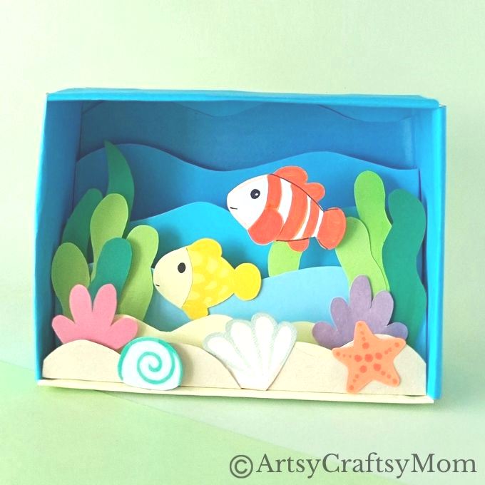 Celebrate the wonderful diversity of ocean life as you make this beautiful cardboard box underwater diorama, filled with colorful fish and plants!