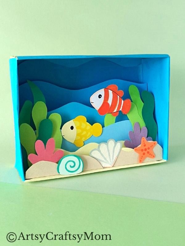 Celebrate the wonderful diversity of ocean life as you make this beautiful cardboard box underwater diorama, filled with colorful fish and plants!