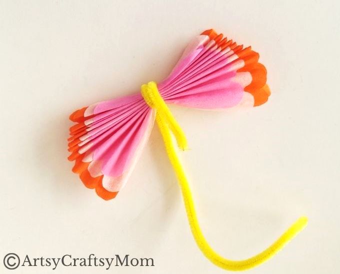 It's amazing how easily colored tissue paper transforms into a gorgeous butterfly, with some help from a pipe cleaner! Perfect for beginner crafters!