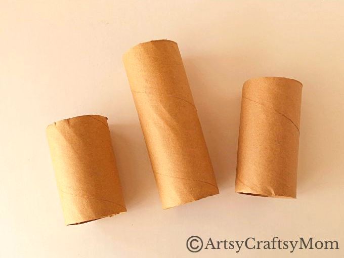 Gather all the empty cardboard tubes you can find - we're going to use them and some craft paper to make a toilet paper roll haunted house craft!