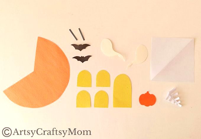 Gather all the empty cardboard tubes you can find - we're going to use them and some craft paper to make a toilet paper roll haunted house craft!