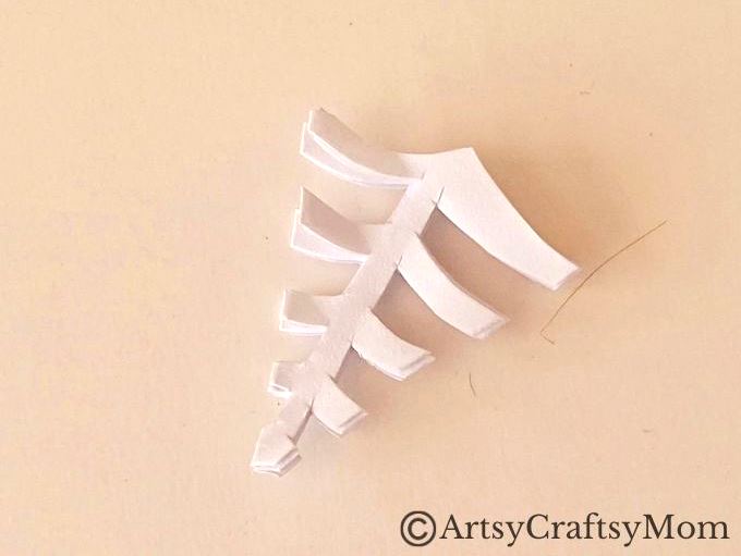 Gather all the empty cardboard tubes you can find - we're going to use them and some craft paper to make a toilet paper roll haunted house craft!