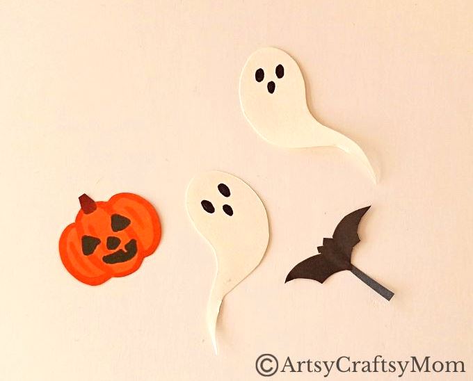 Gather all the empty cardboard tubes you can find - we're going to use them and some craft paper to make a toilet paper roll haunted house craft!