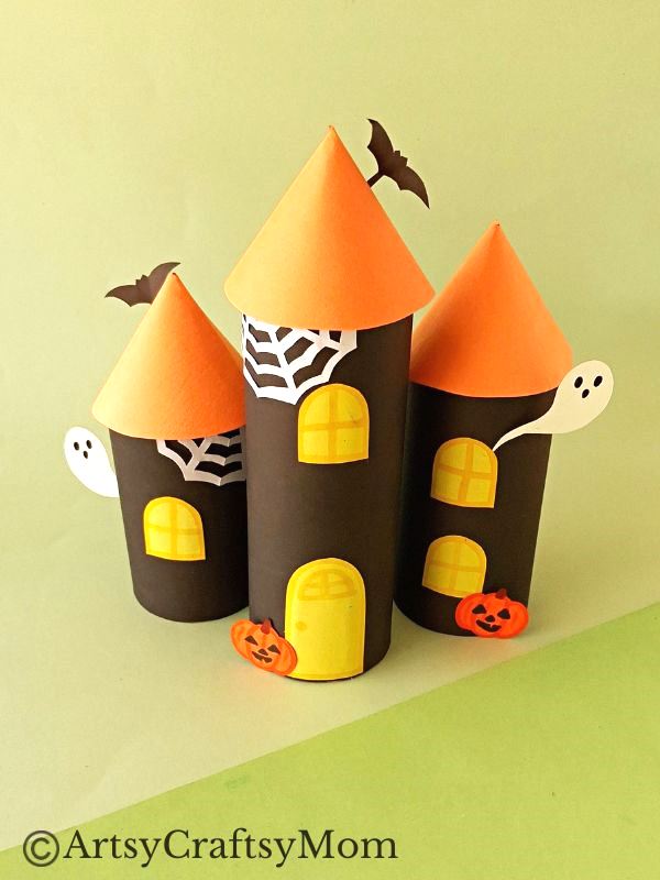 Gather all the empty cardboard tubes you can find - we're going to use them and some craft paper to make a toilet paper roll haunted house craft!